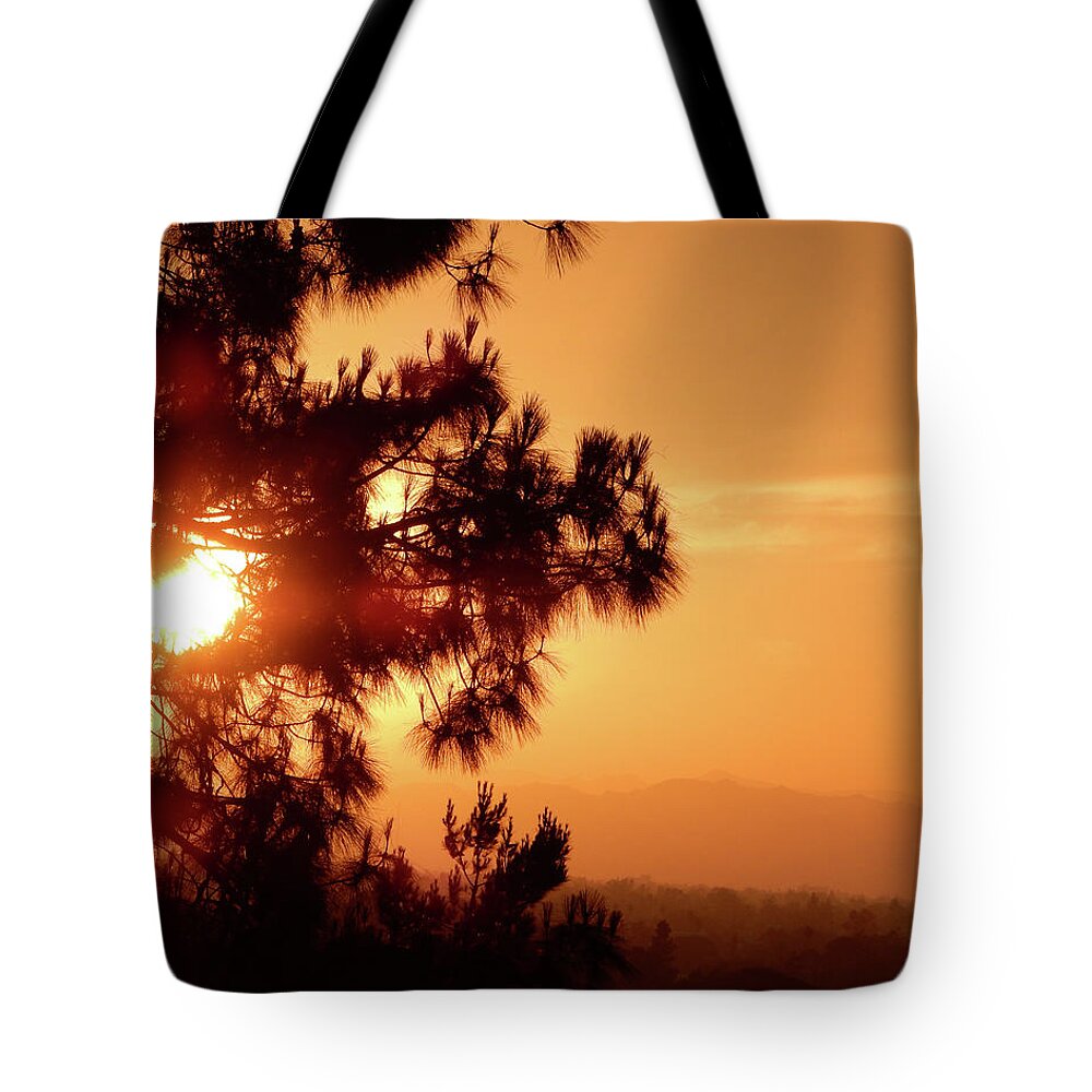 Luck Tote Bag featuring the photograph Lucky Sunset by Andrew Lawrence