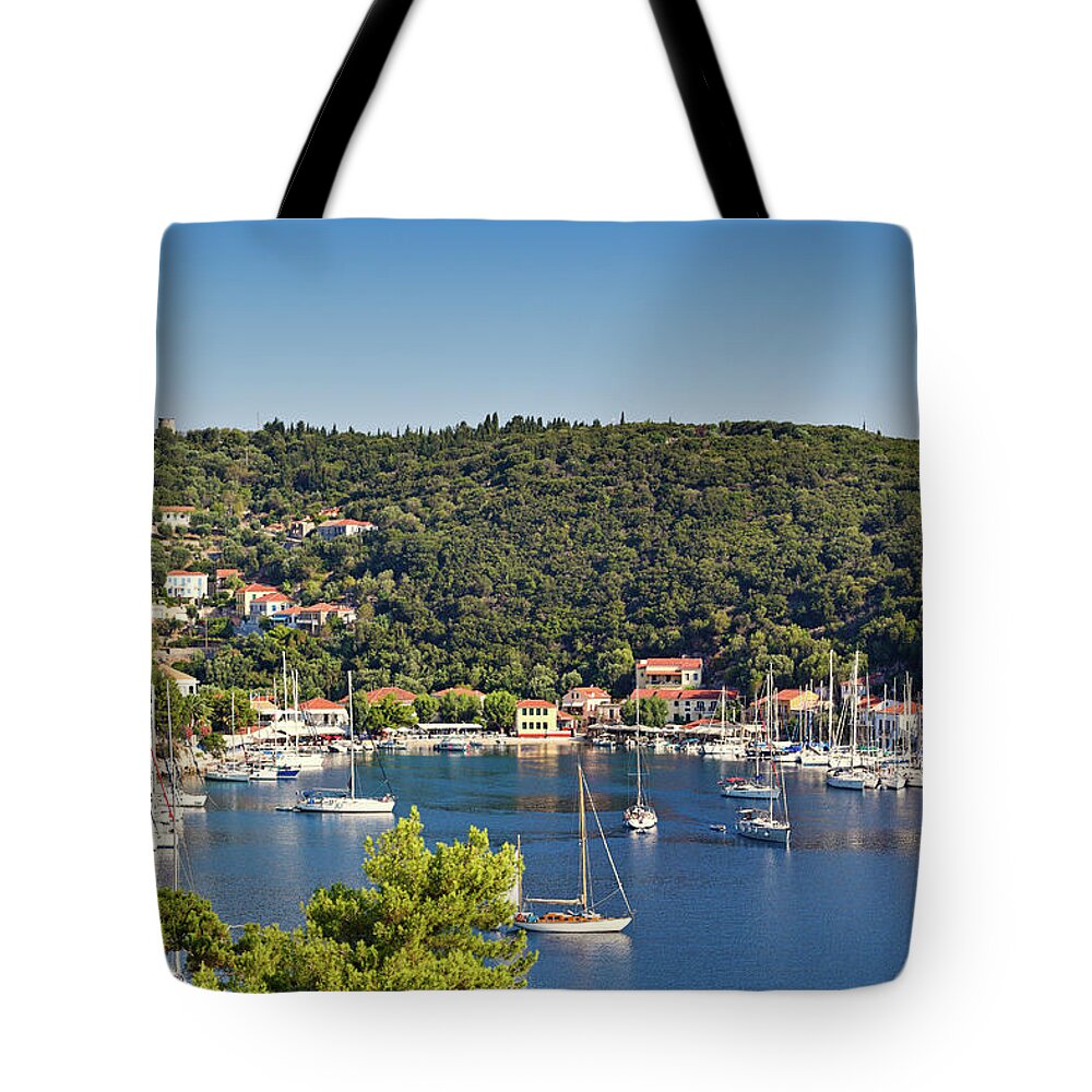Kioni Tote Bag featuring the photograph Kioni in Ithaki island, Greece #1 by Constantinos Iliopoulos