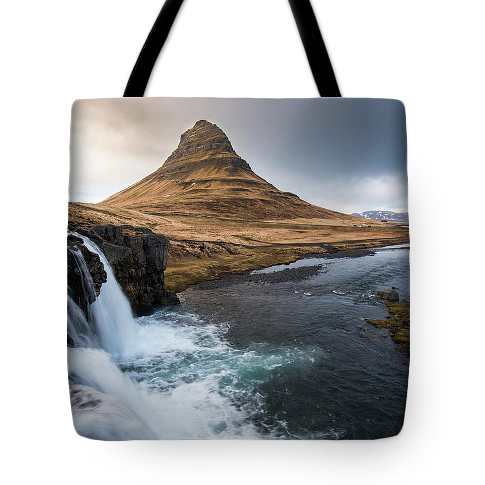 Iceland Tote Bag featuring the photograph Kirkjufell mountain and the kirkjufellfoss waterfall in Iceland #2 by Michalakis Ppalis