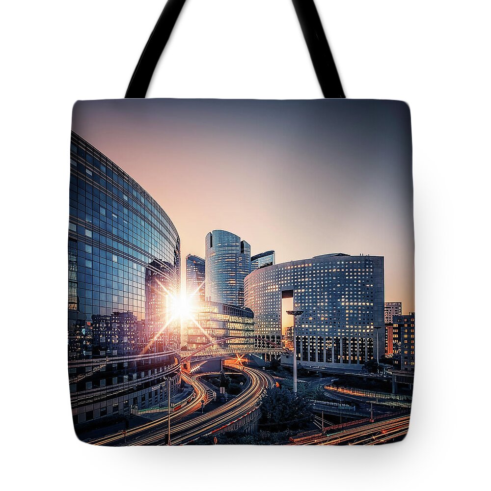 France Tote Bag featuring the photograph La Defense Sunset #1 by Manjik Pictures
