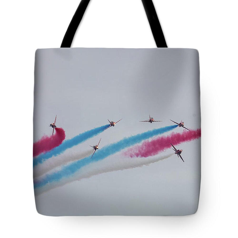 Eastbourne International Airshow Tote Bag featuring the photograph Red Arrows over Eastbourne by Andrew Lalchan