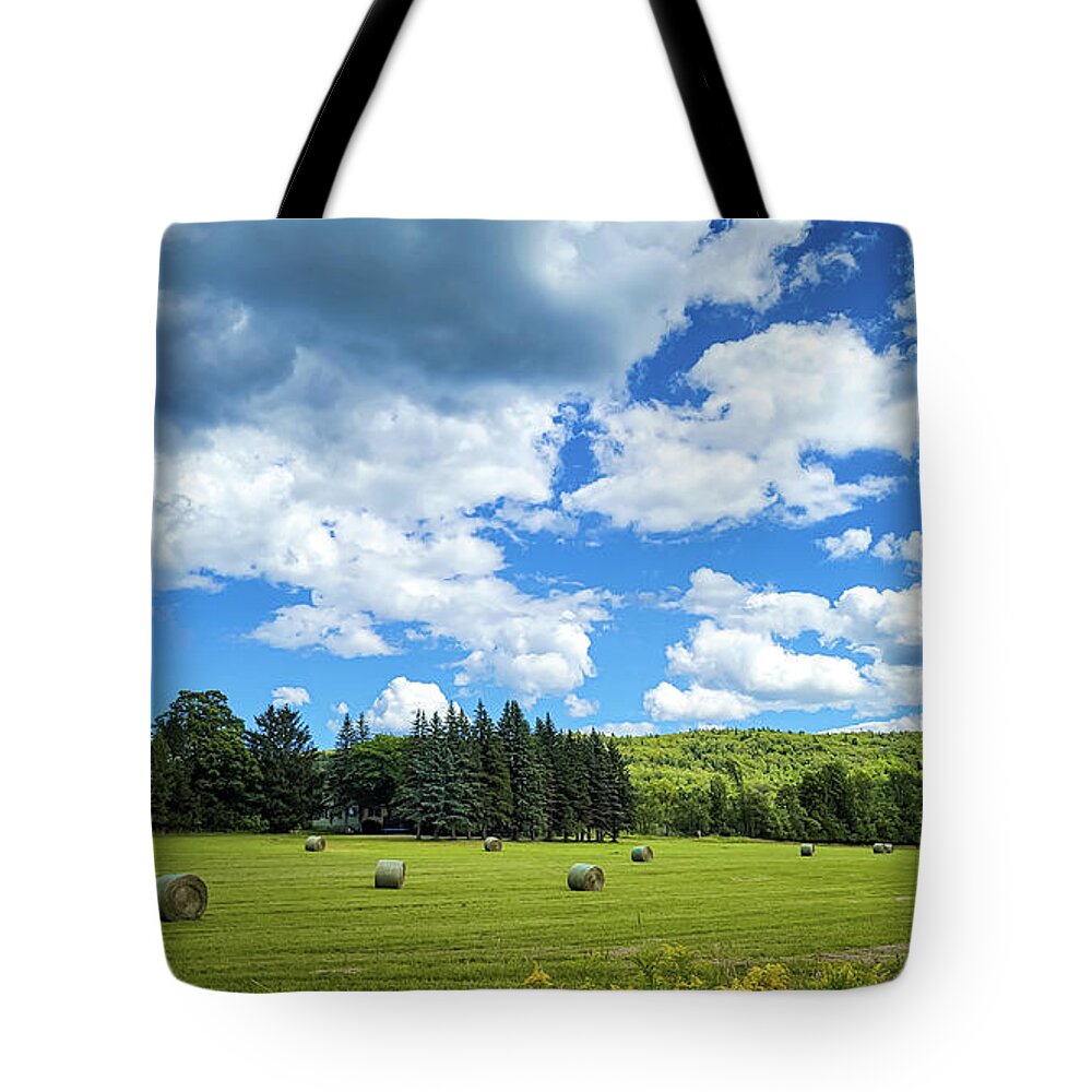 Canada Tote Bag featuring the photograph Hay Bales on Roadtrip Canada by Mary Capriole