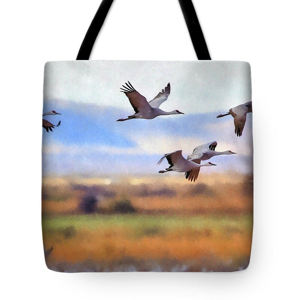 Sandhill Cranes Tote Bag featuring the photograph Sandhill Cranes In Flight #1 by Robert Harris