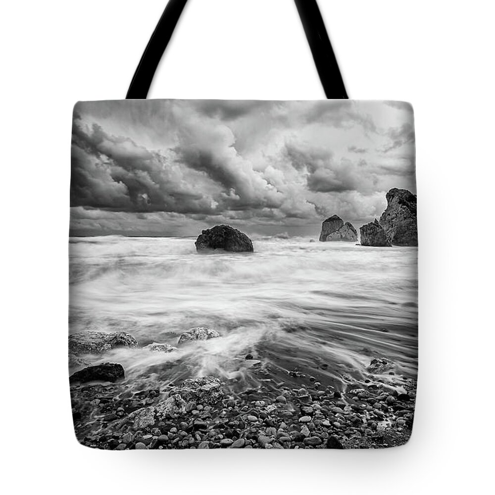 Seascape Tote Bag featuring the photograph Seascape with windy waves during storm weather at the a rocky co #3 by Michalakis Ppalis