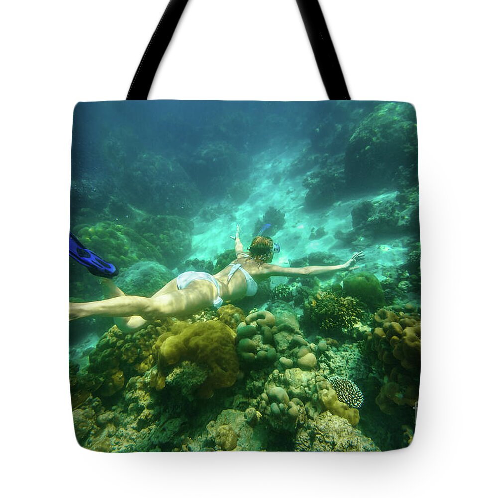 Surin Islands Tote Bag featuring the photograph Woman bikini apnea Surin Islands #1 by Benny Marty
