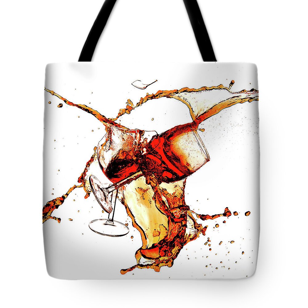 Damaged Tote Bag featuring the photograph Broken wine glasses with wine splashes on a white background by Michalakis Ppalis