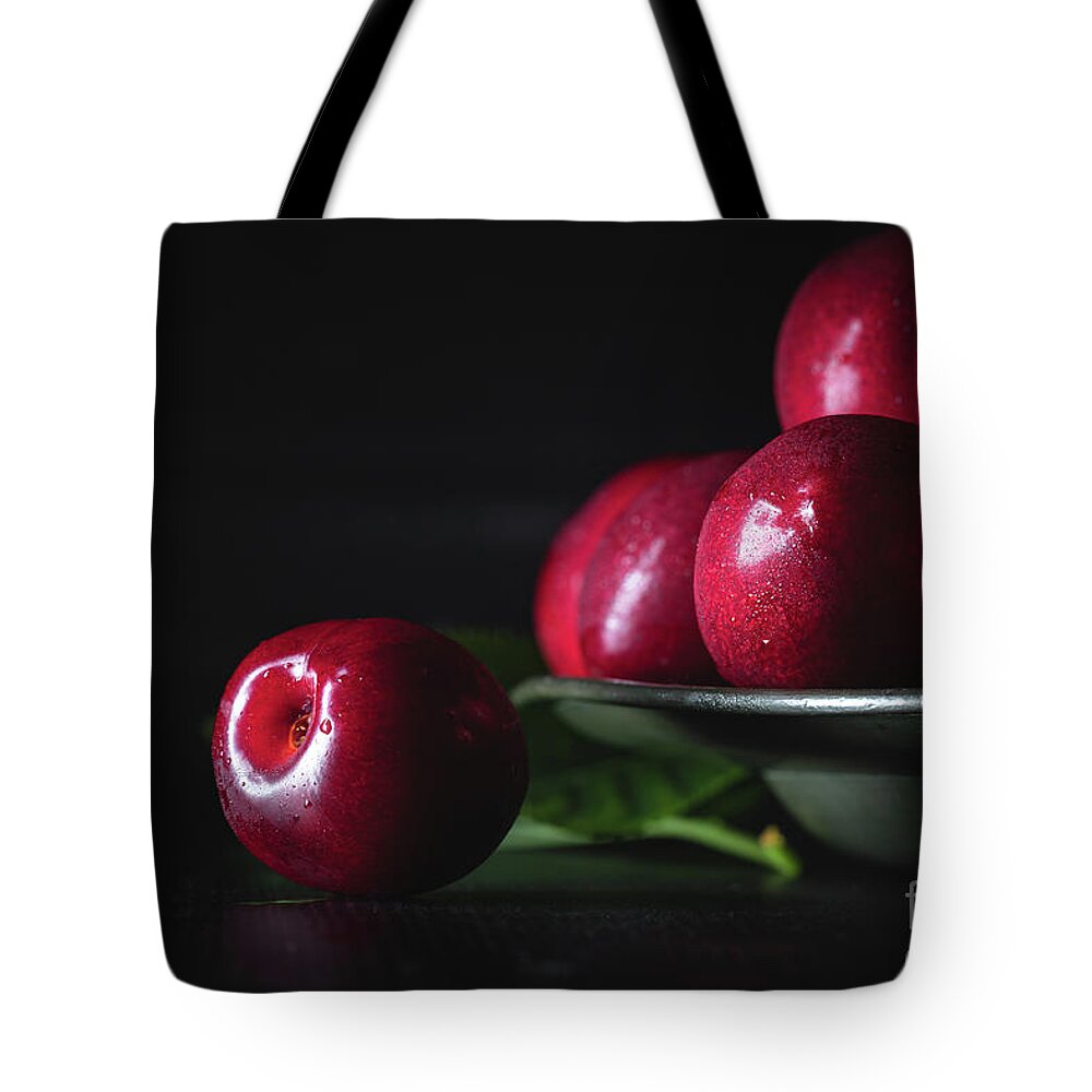 Vegan Tote Bag featuring the photograph Dark red cherries on a pewter plate #2 by Jane Rix