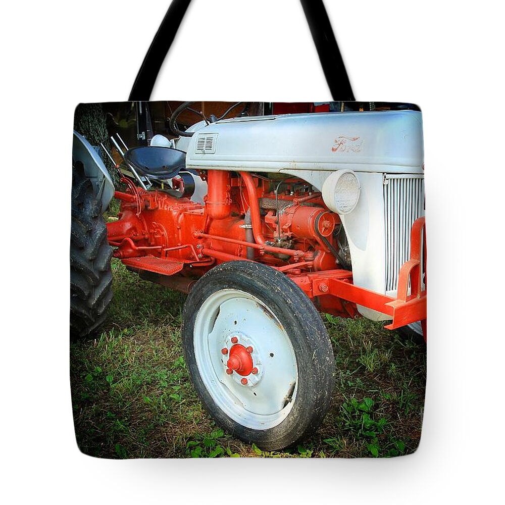 Ford Tractor Tote Bag featuring the photograph Ford Tractor by Mike Eingle