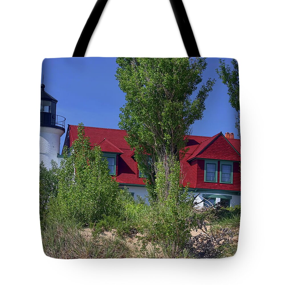 Lighthouse Tote Bag featuring the photograph Point Betsie Lighthouse II by Joan Bertucci