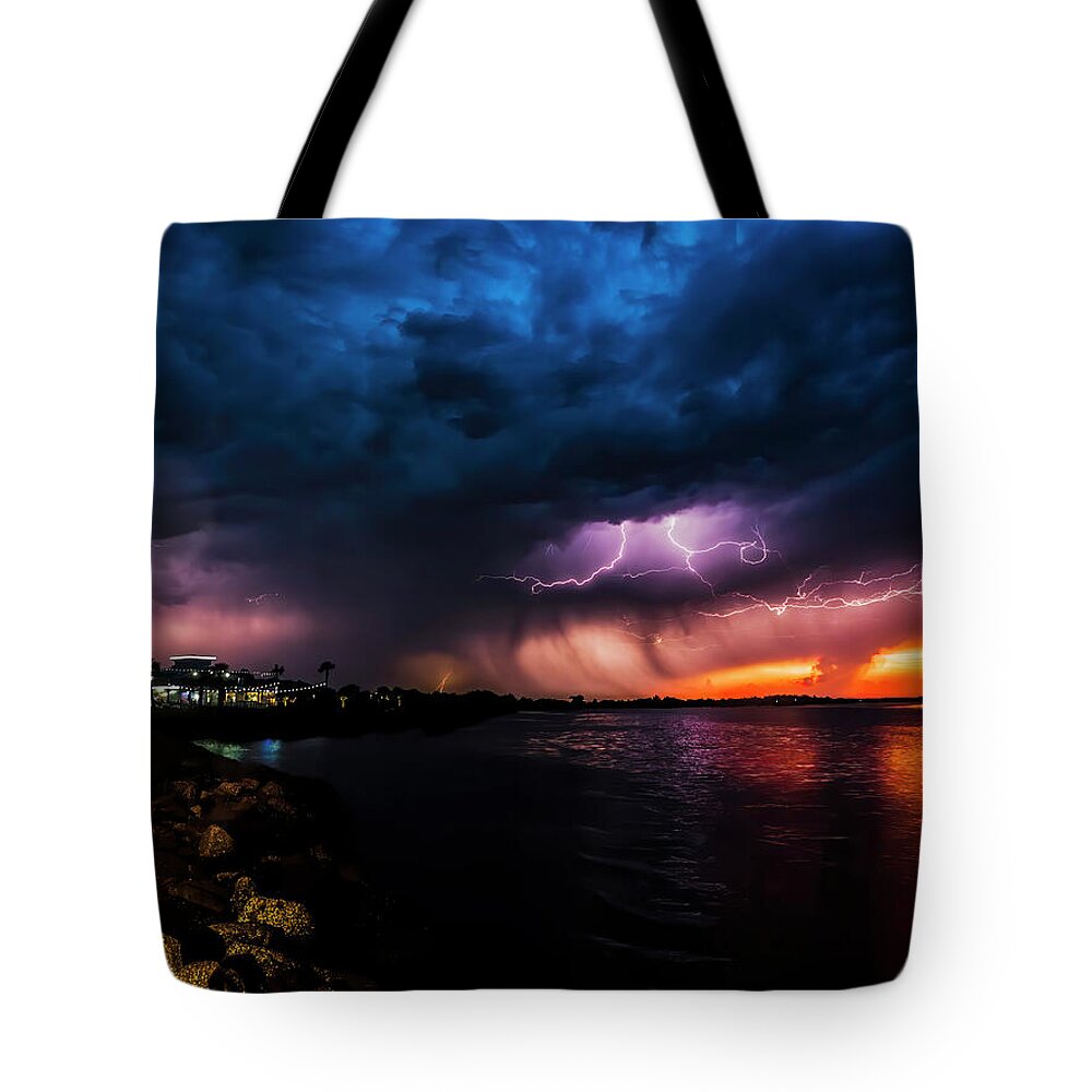 Storm Tote Bag featuring the photograph Stormy Sunset #1 by Jerry Connally