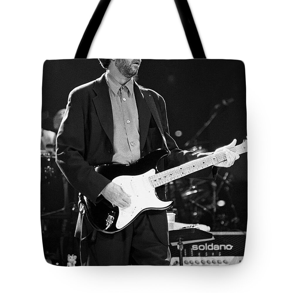 Singer Tote Bag featuring the photograph Eric Clapton #24 by Concert Photos
