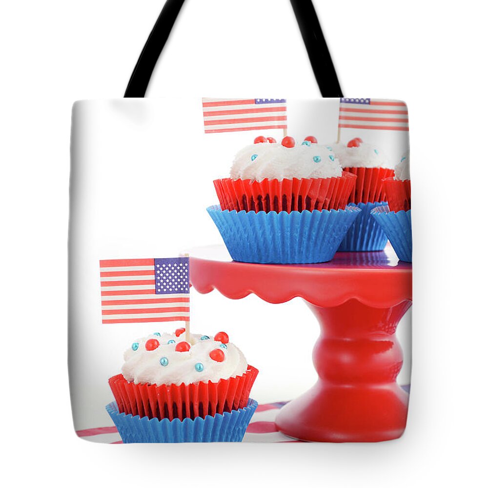Celebrate Tote Bag featuring the photograph Happy Fourth of July Cupcakes on Red Stand #3 by Milleflore Images