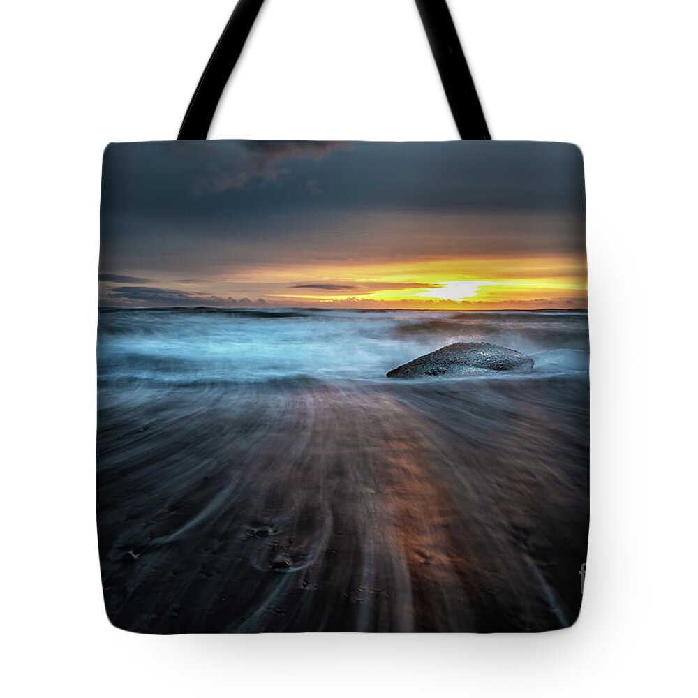 Beach Tote Bag featuring the photograph Sunrise on Diamond Beach, Southeast Iceland. by Jane Rix