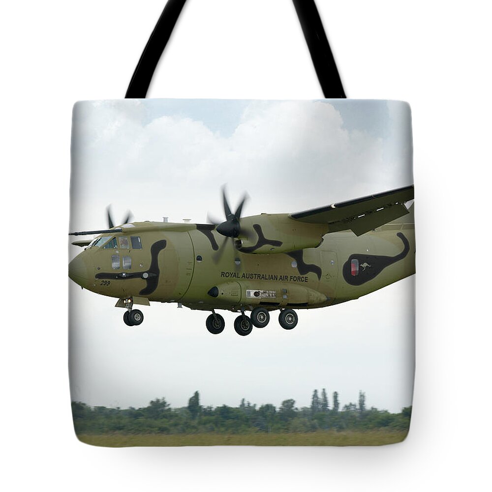 Spartan Tote Bag featuring the digital art RAAF C-27J Spartan Wooded by Custom Aviation Art