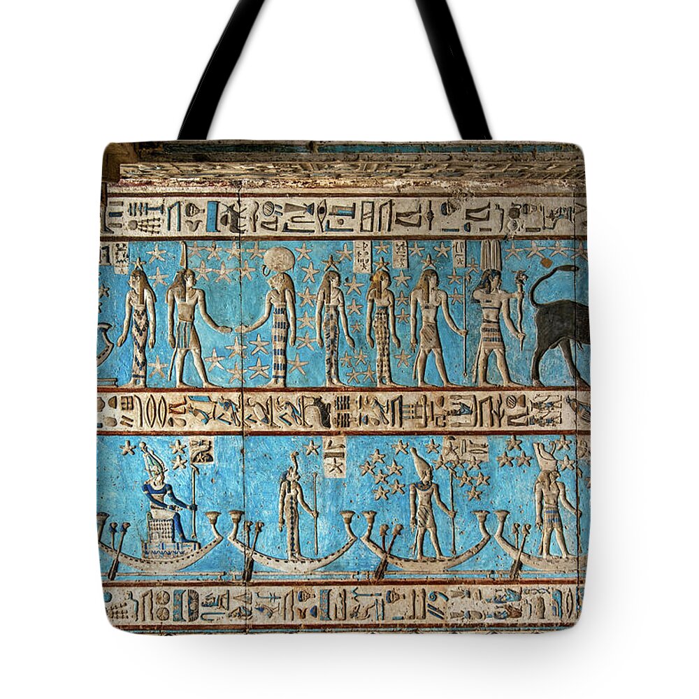 Egypt Tote Bag featuring the photograph Hieroglyphic carvings in ancient egyptian temple #35 by Mikhail Kokhanchikov