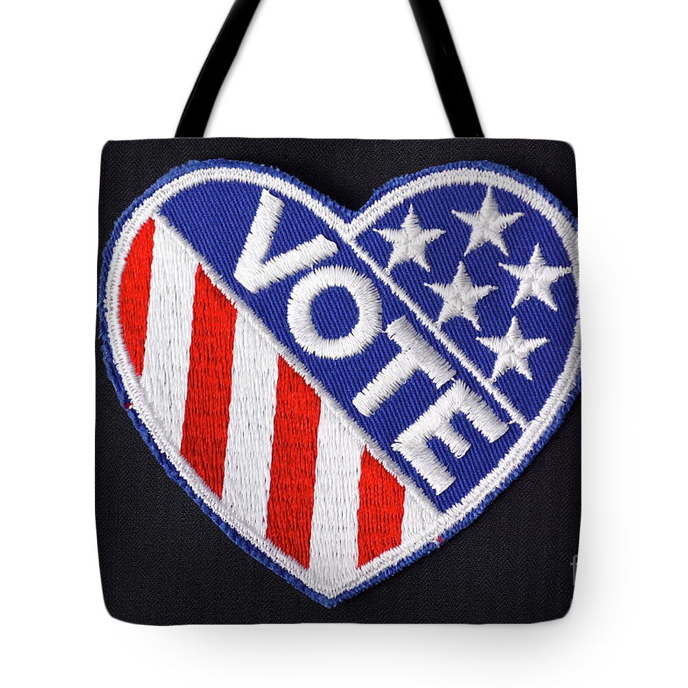 Blue Tote Bag featuring the photograph USA Vote Badge on suit pocket. #4 by Milleflore Images