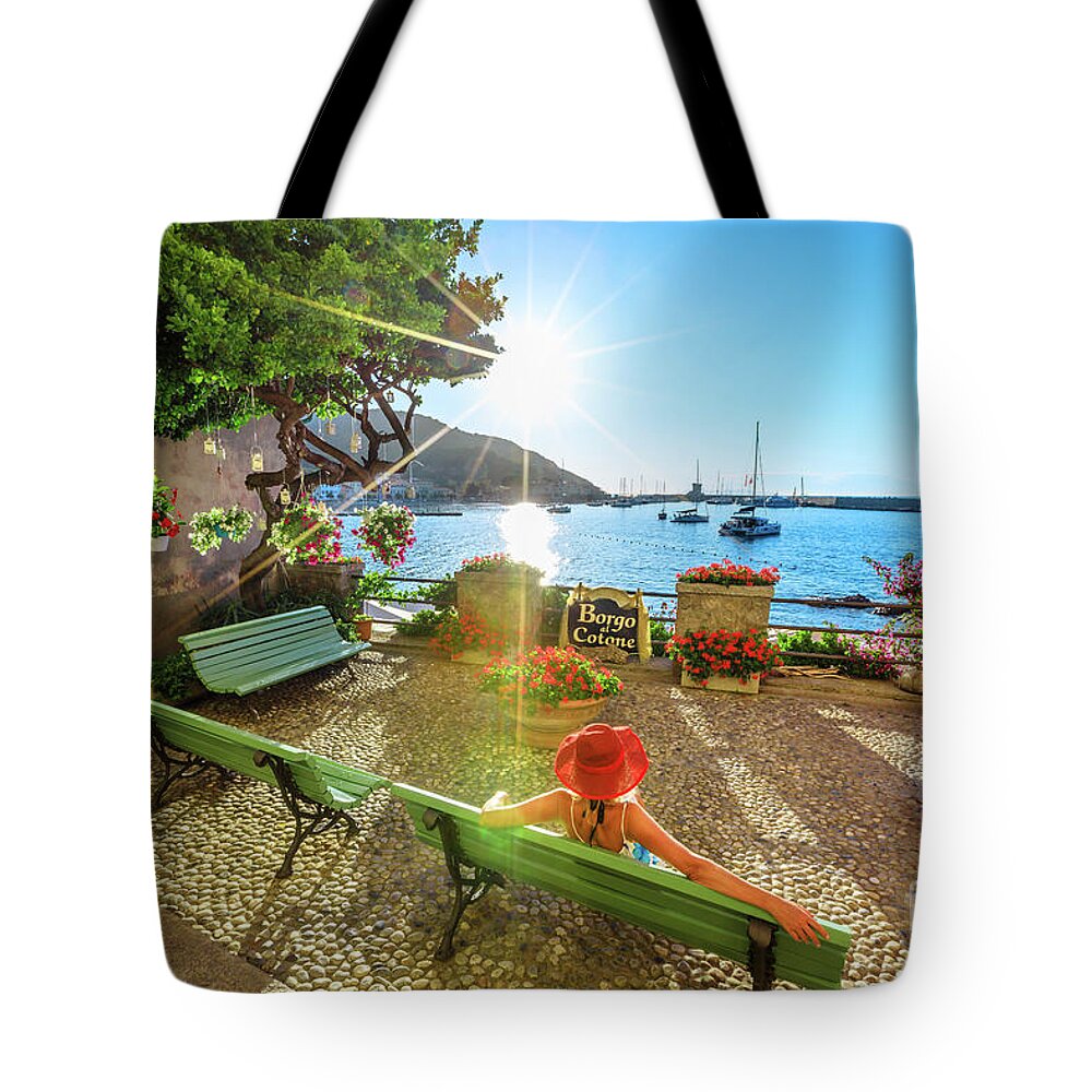 Elba Tote Bag featuring the photograph Marciana Marina Tourist woman #7 by Benny Marty