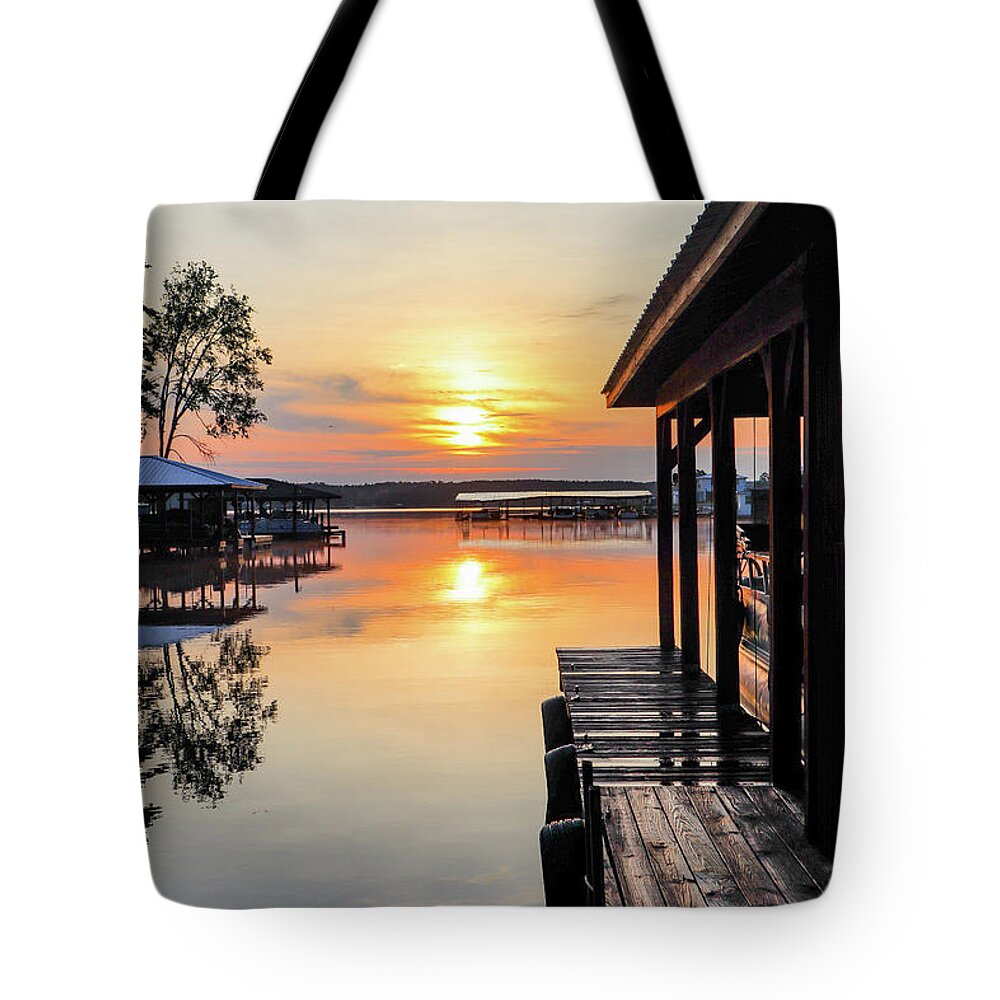 Sunrise Tote Bag featuring the photograph A Boathouse Side Sunrise by Ed Williams