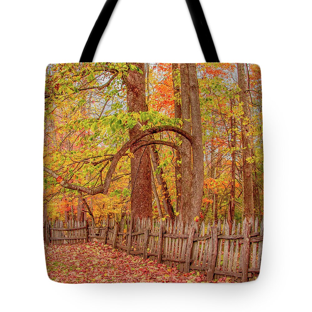 Oconaluftee Tote Bag featuring the photograph A Crooked Old Fence in the Shadow of Fall by Marcy Wielfaert