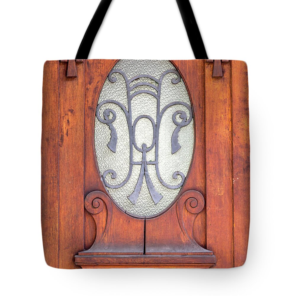 Old Tote Bag featuring the photograph A Door in Ljubljana by W Chris Fooshee