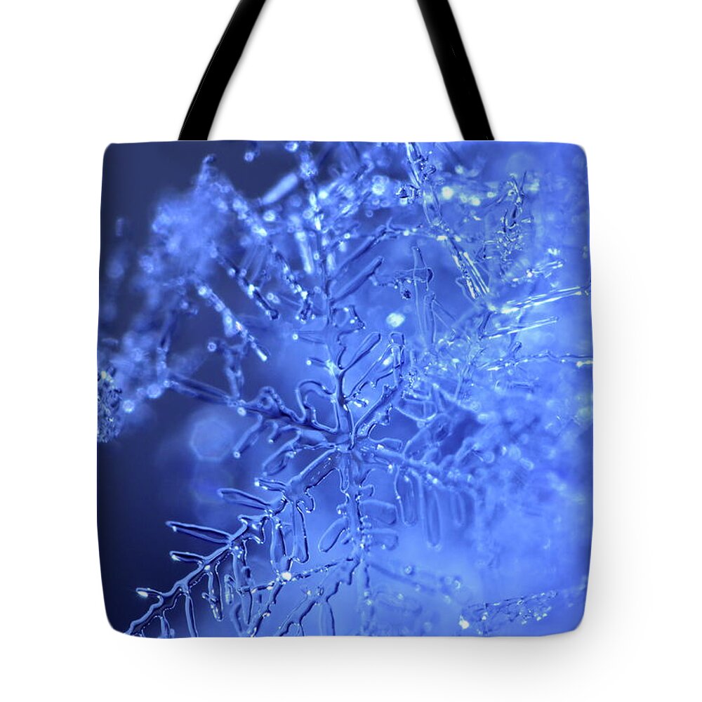 Abstract Tote Bag featuring the photograph A fragile blue snowflake by Ulrich Kunst And Bettina Scheidulin