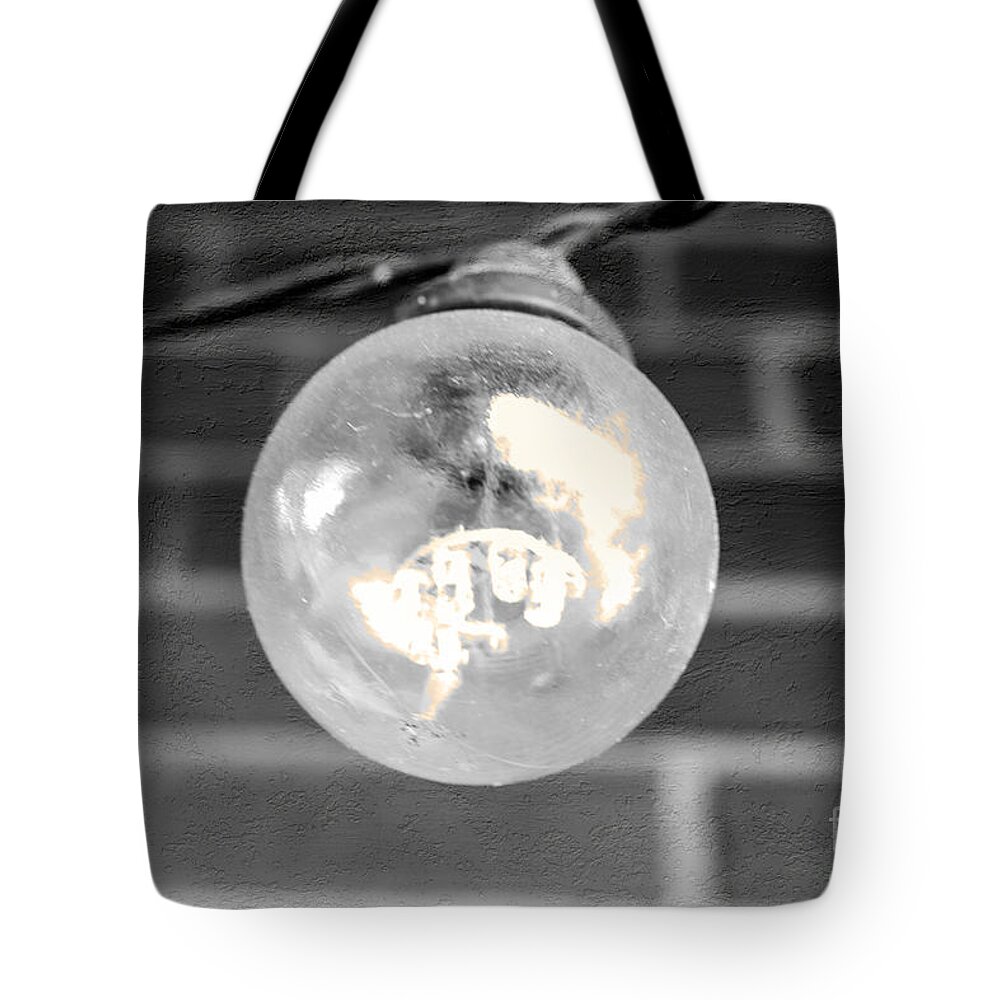 Light Tote Bag featuring the photograph A light by Bentley Davis