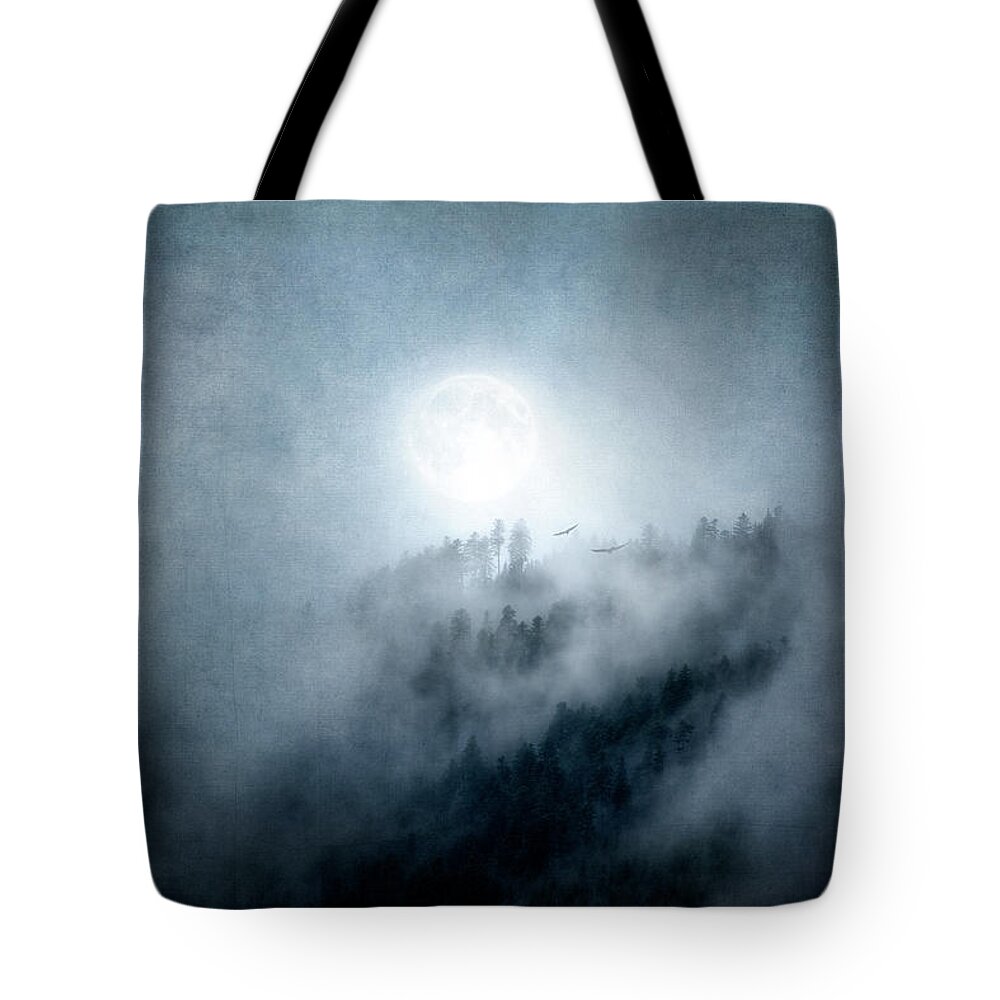 Landscape Tote Bag featuring the photograph A Moon in the Mist by Philippe Sainte-Laudy