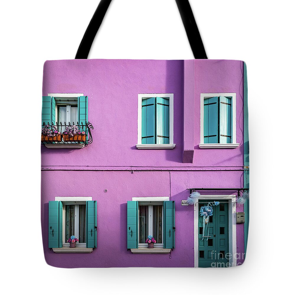Wall Tote Bag featuring the photograph A pink house in Burano, Italy by Lyl Dil Creations