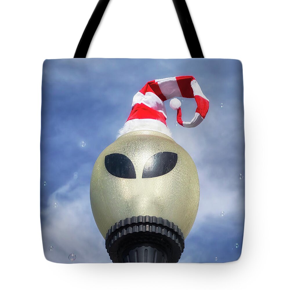 Roswell Nm Tote Bag featuring the photograph A Roswell Christmas Streetlight by Susan Rissi Tregoning