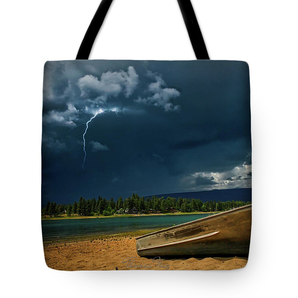 North America Tote Bag featuring the photograph A storm is brewing by Thomas Nay