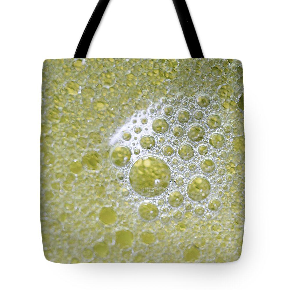 Abstract Photography Tote Bag featuring the photograph Abstract Photography - Gold Bubbles by Amelia Pearn