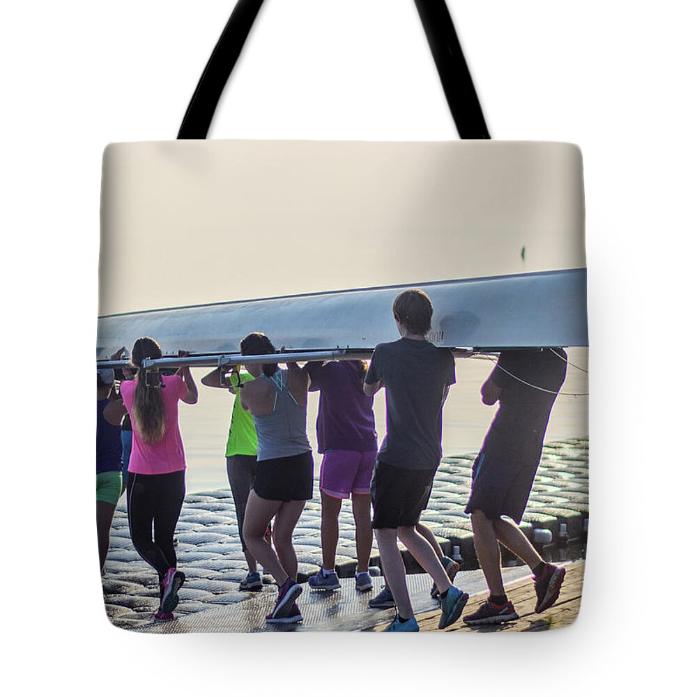 Putting The Canoe In The Water On Lake Simcoe Tote Bag featuring the photograph All Together Now by James Canning