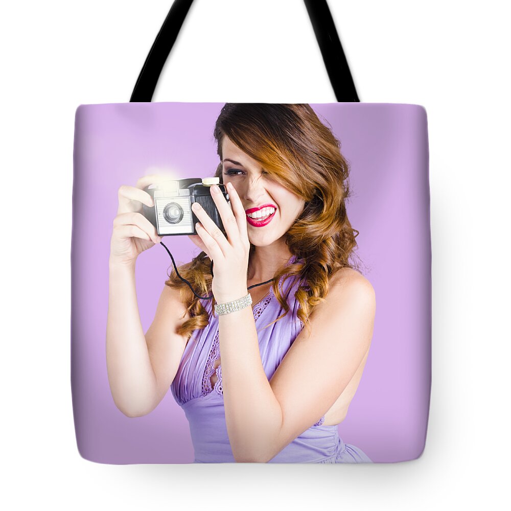 Camera Tote Bag featuring the photograph Amateur photographer practising with retro camera by Jorgo Photography