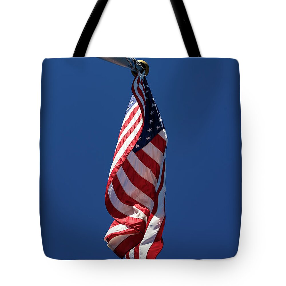 American Flag Tote Bag featuring the photograph American Flag by Amelia Pearn