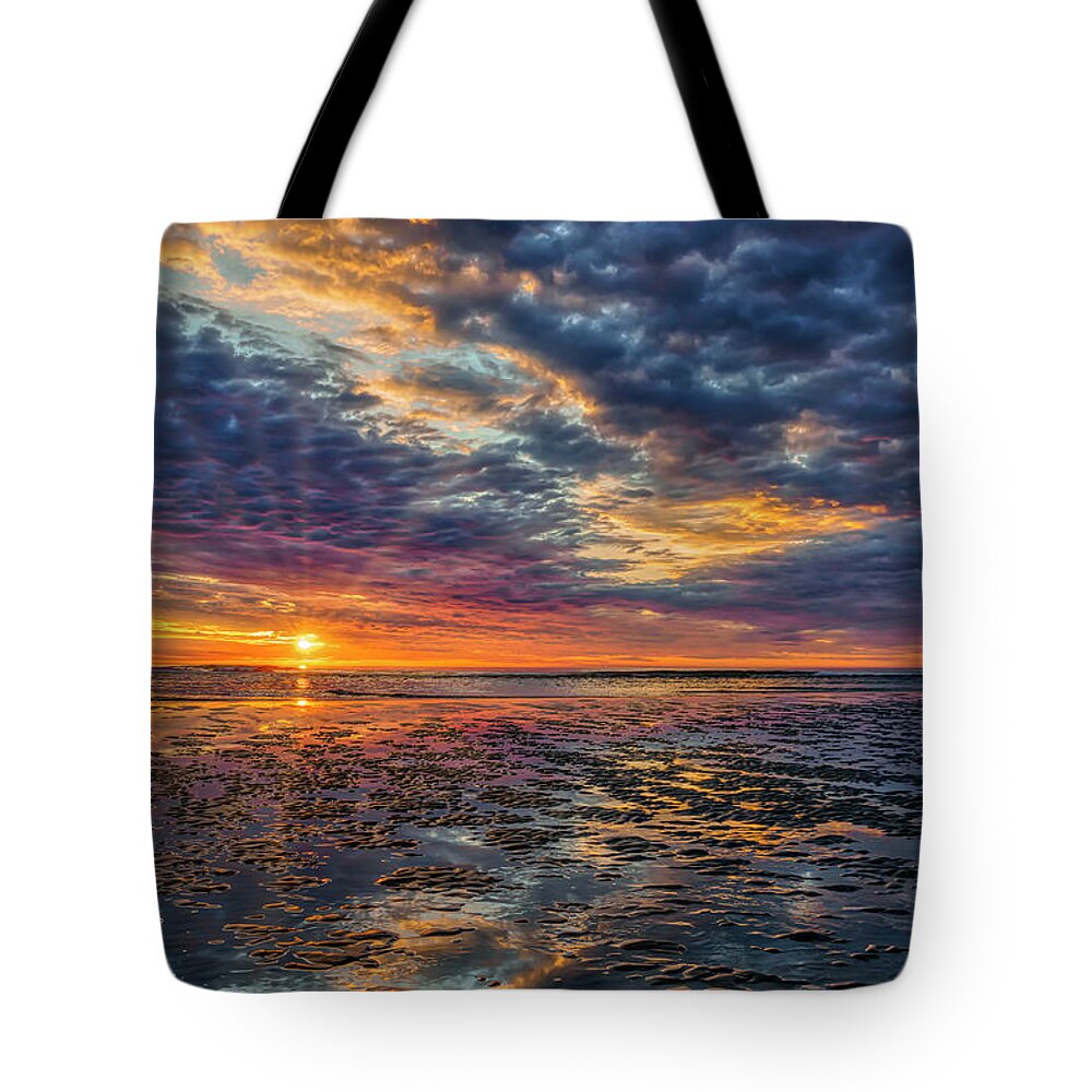 Sunrise Tote Bag featuring the photograph An Ogunquit Sunrise by Penny Polakoff