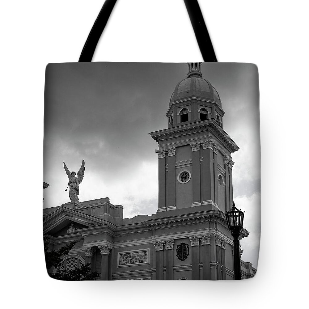 Cuba Tote Bag featuring the photograph Angel Amid the Storm by M Kathleen Warren