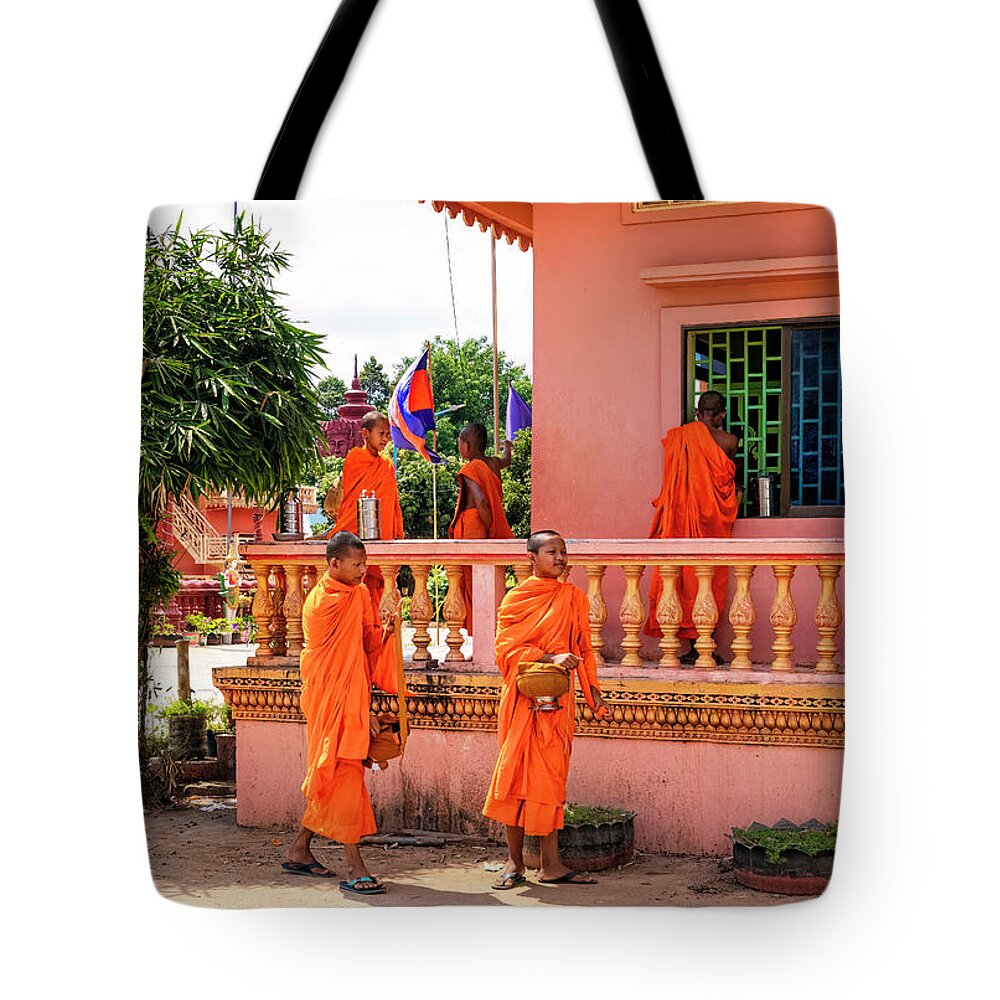 Angkor Ban Novice Monks Tote Bag featuring the photograph Angkor Ban Novice Monks by Carolyn Derstine