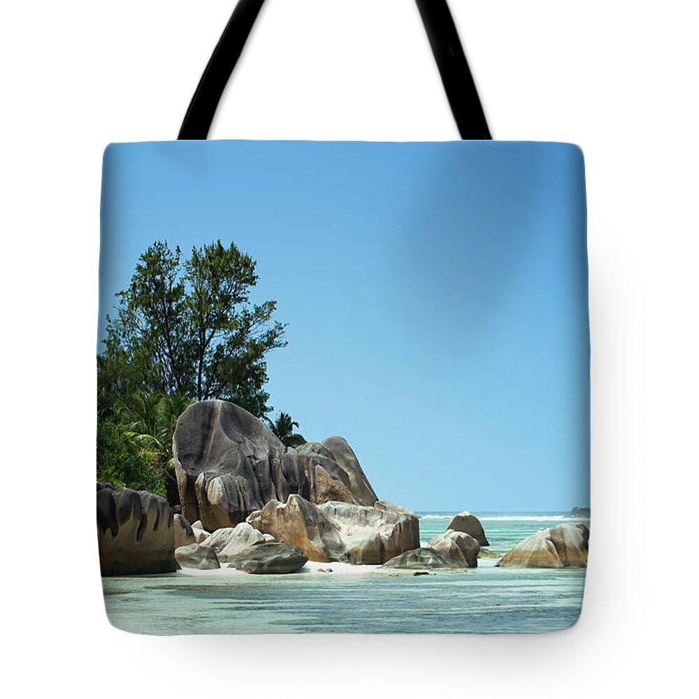 Seychelles Islands Tote Bag featuring the pyrography Anse source d'argent beach in La Digue, in Seychelles Islands by Jean-Luc Farges