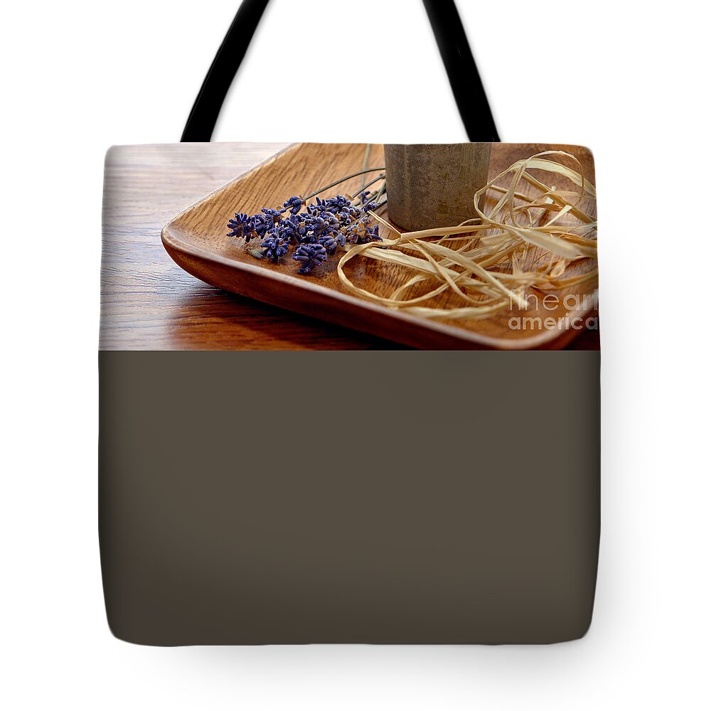 Aromatherapy Tote Bag featuring the photograph Aromatherapy Candle on Rocks in a Spa by Olivier Le Queinec