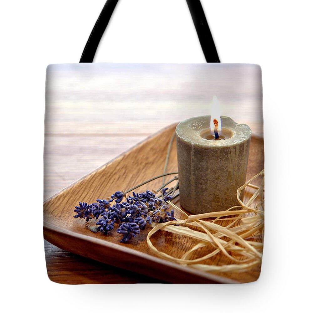 Aromatherapy Tote Bag featuring the photograph Aromatherapy Candle in a Wood Plate in a Spa by Olivier Le Queinec