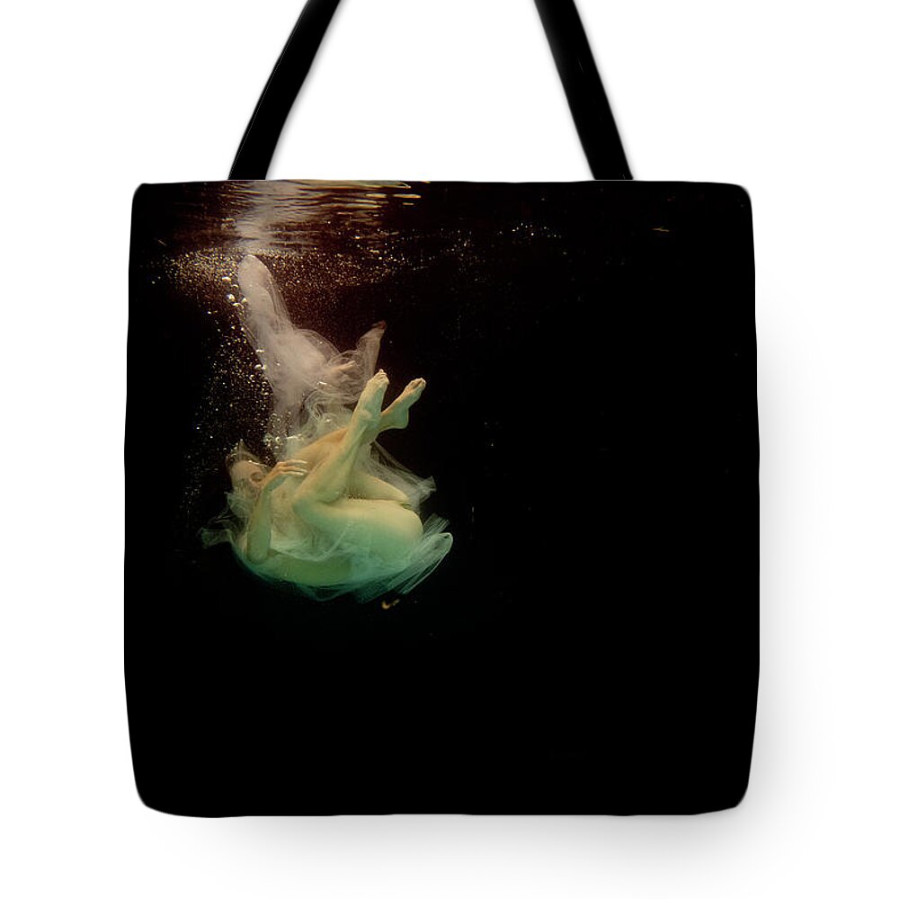 Artist Tote Bag featuring the photograph Artist magically floating with her flute 7 by Dan Friend
