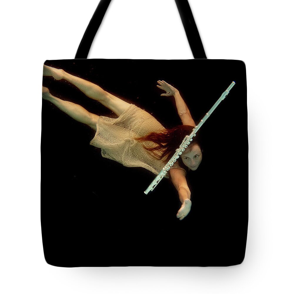Artist Tote Bag featuring the photograph Artist magically floating with her flute 73 by Dan Friend