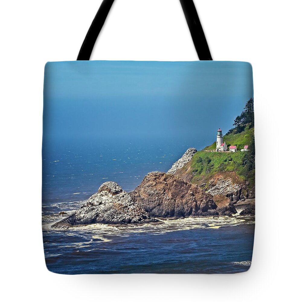 Promontory Tote Bag featuring the photograph Haceta Head Lighthouse by Loren Gilbert