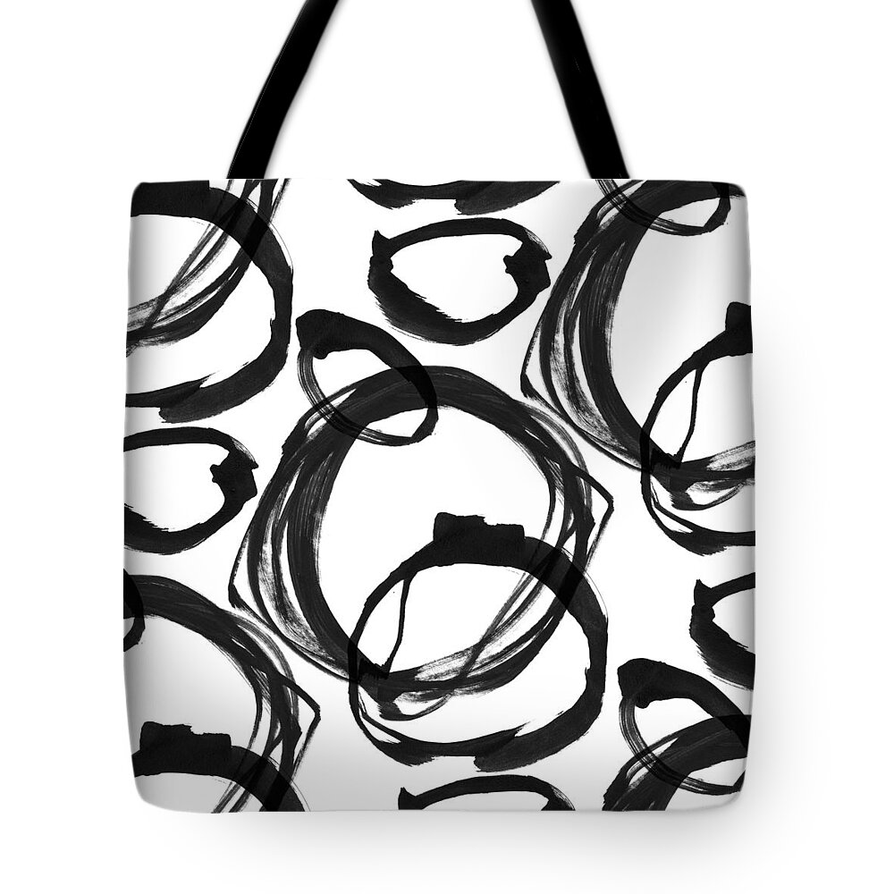 Black Tote Bag featuring the painting Ink Rings 3 Black and White Abstract Painting by Janine Aykens