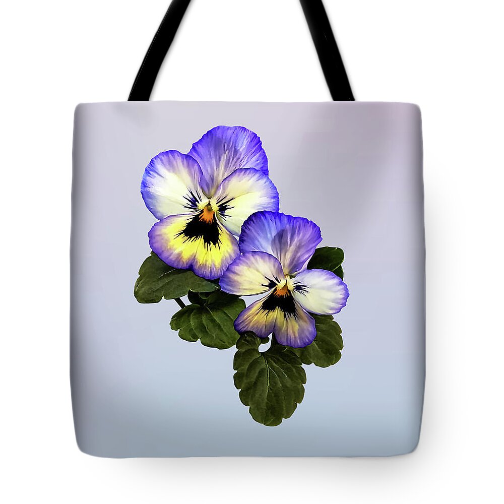 Pansy Tote Bag featuring the photograph Pansy Duo by Susan Savad