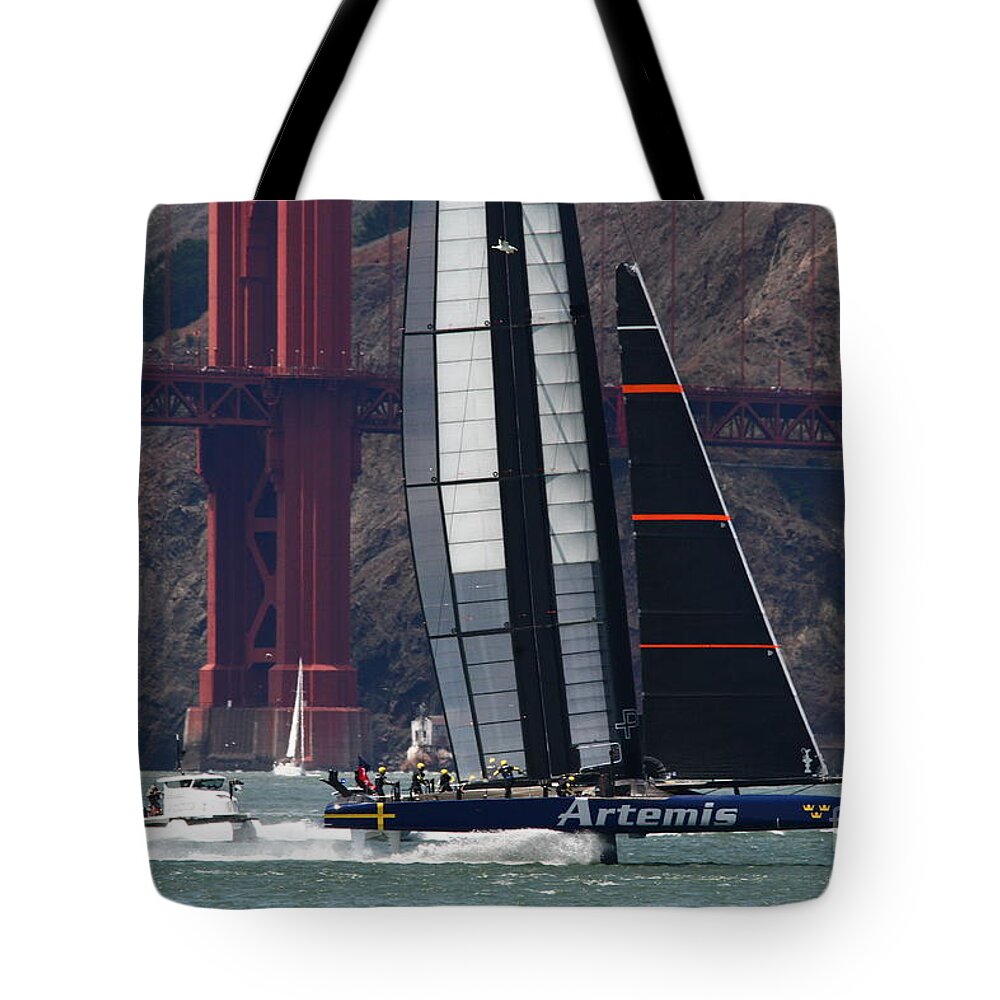 Sports Event Tote Bag featuring the photograph At the Turn by Tony Lee
