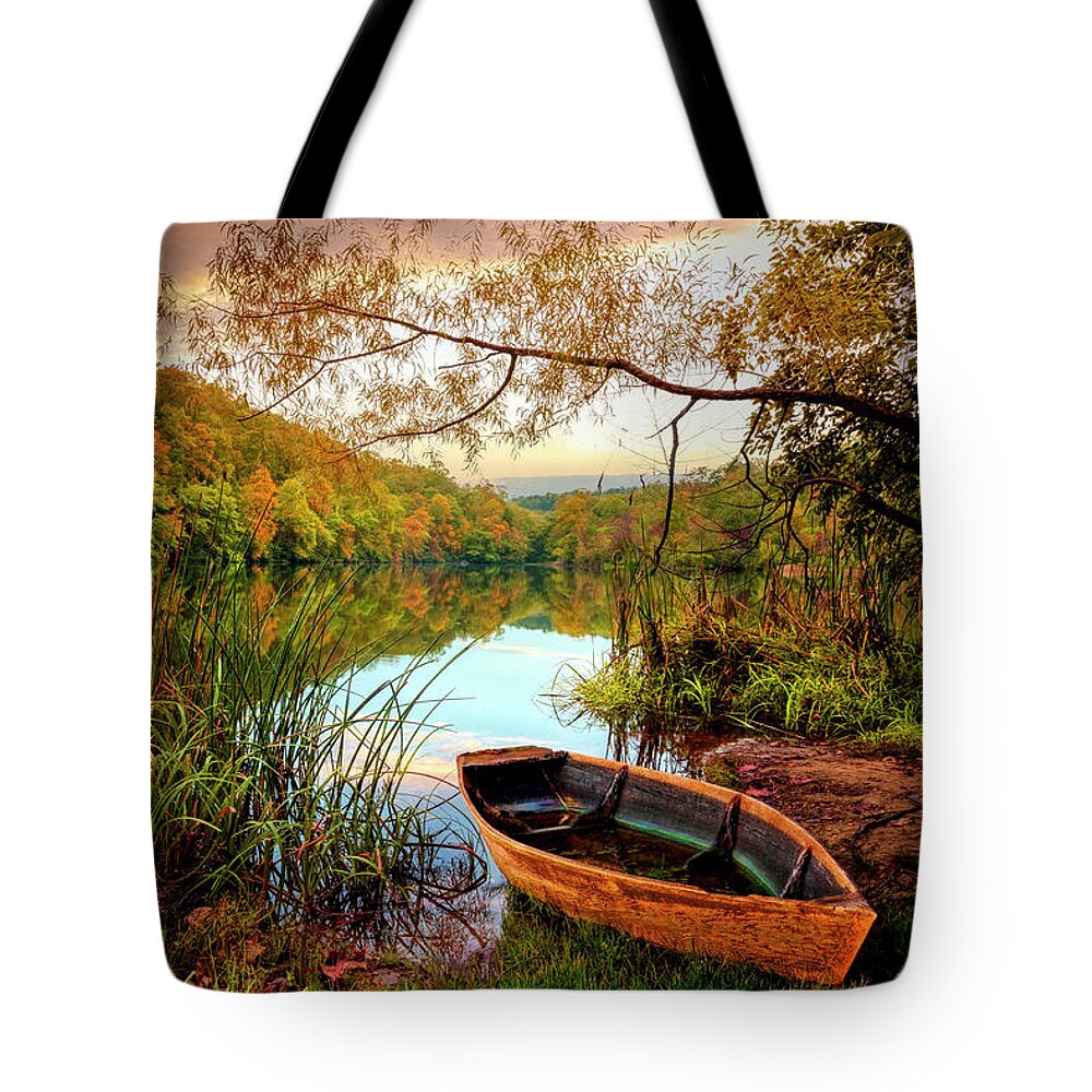 Carolina Tote Bag featuring the photograph Autumn Rowboat by Debra and Dave Vanderlaan