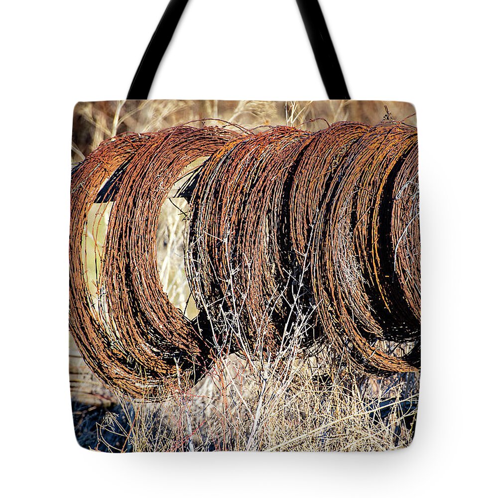 Wire Tote Bag featuring the photograph Barbed Wire by Dart Humeston