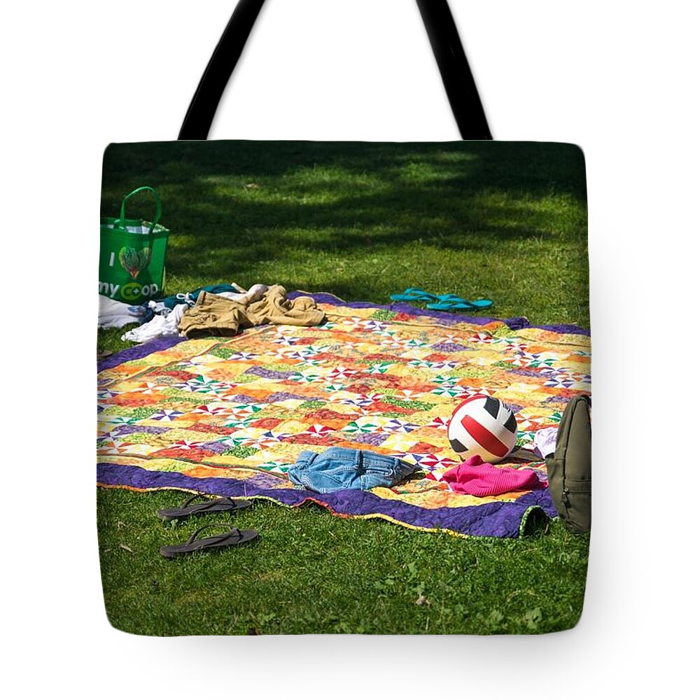 Barefoot In The Grass Tote Bag featuring the photograph Barefoot in the Grass by Tom Cochran