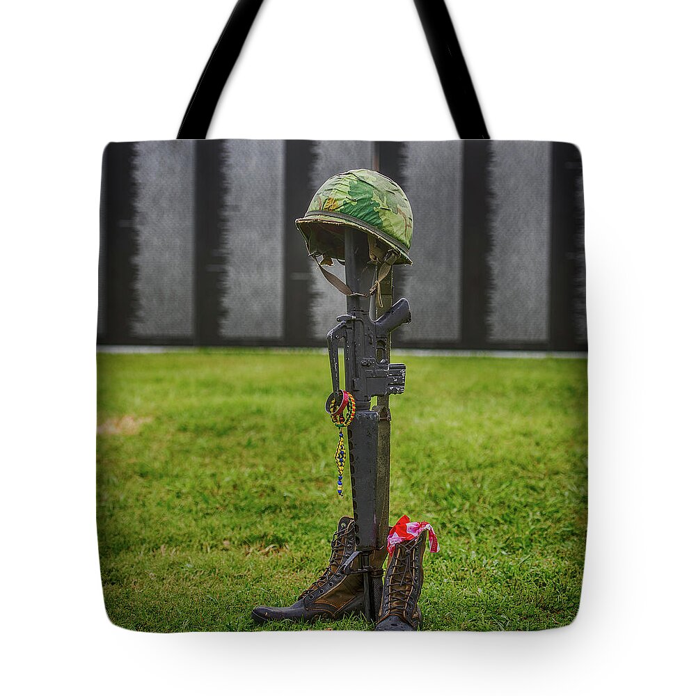 Battle Tote Bag featuring the photograph Battle Field Cross At the Traveling Wall by Paul Freidlund